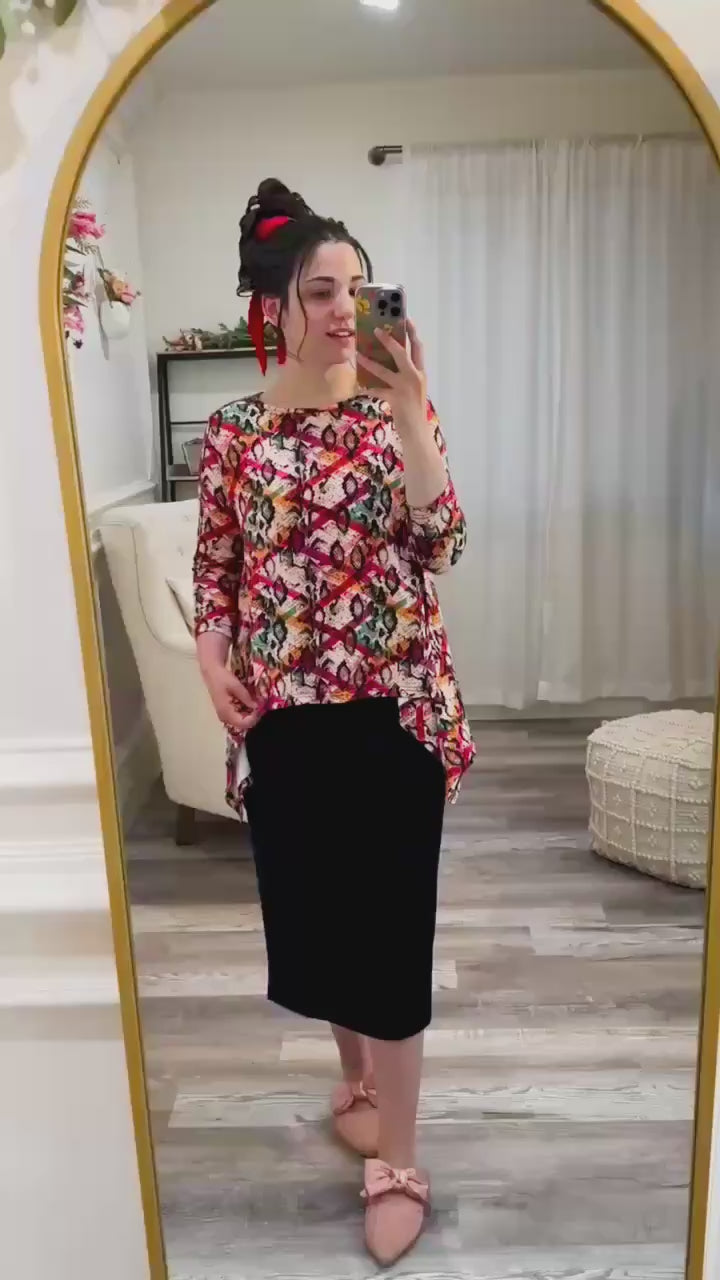 Model wearing Norie Top in motion – modest 3/4 sleeve top with flowy fit