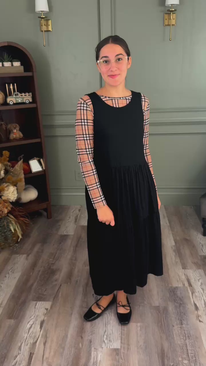 Model demonstrates the Nuggles® Mesh Layering Top, highlighting the sheer texture and layered fit.