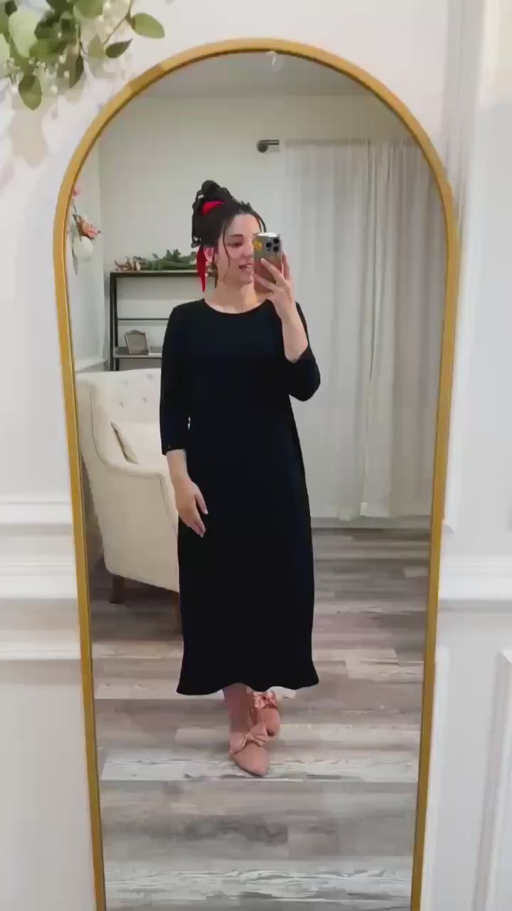 Video of Nuggles® Allie Dress in motion – Modest T-shirt dress with ribbed knit fabric, 3/4 sleeves, and front pocket shown on model.