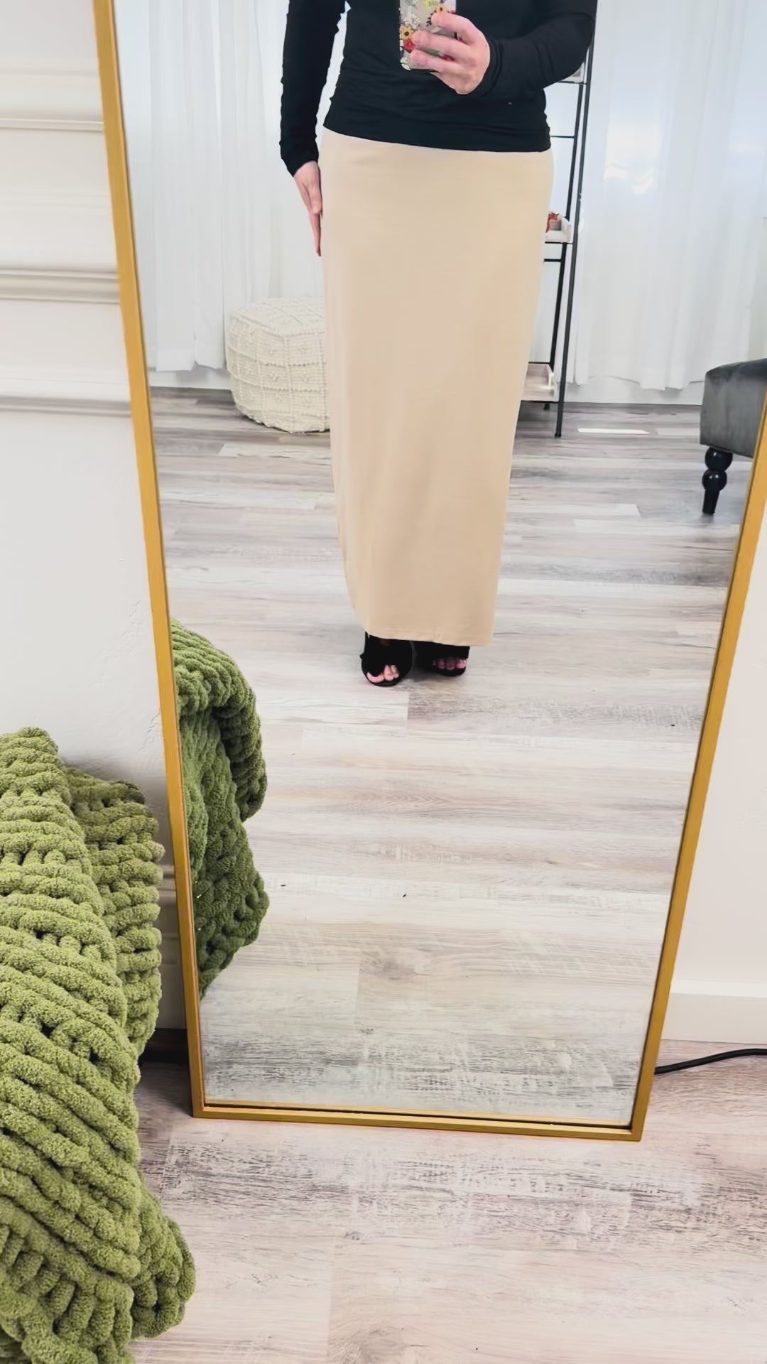 A video where Chantelle shows the fit and features of the 36" Classic Skirt, including that it hits well below the ankle. It has a premium knit and great fit.