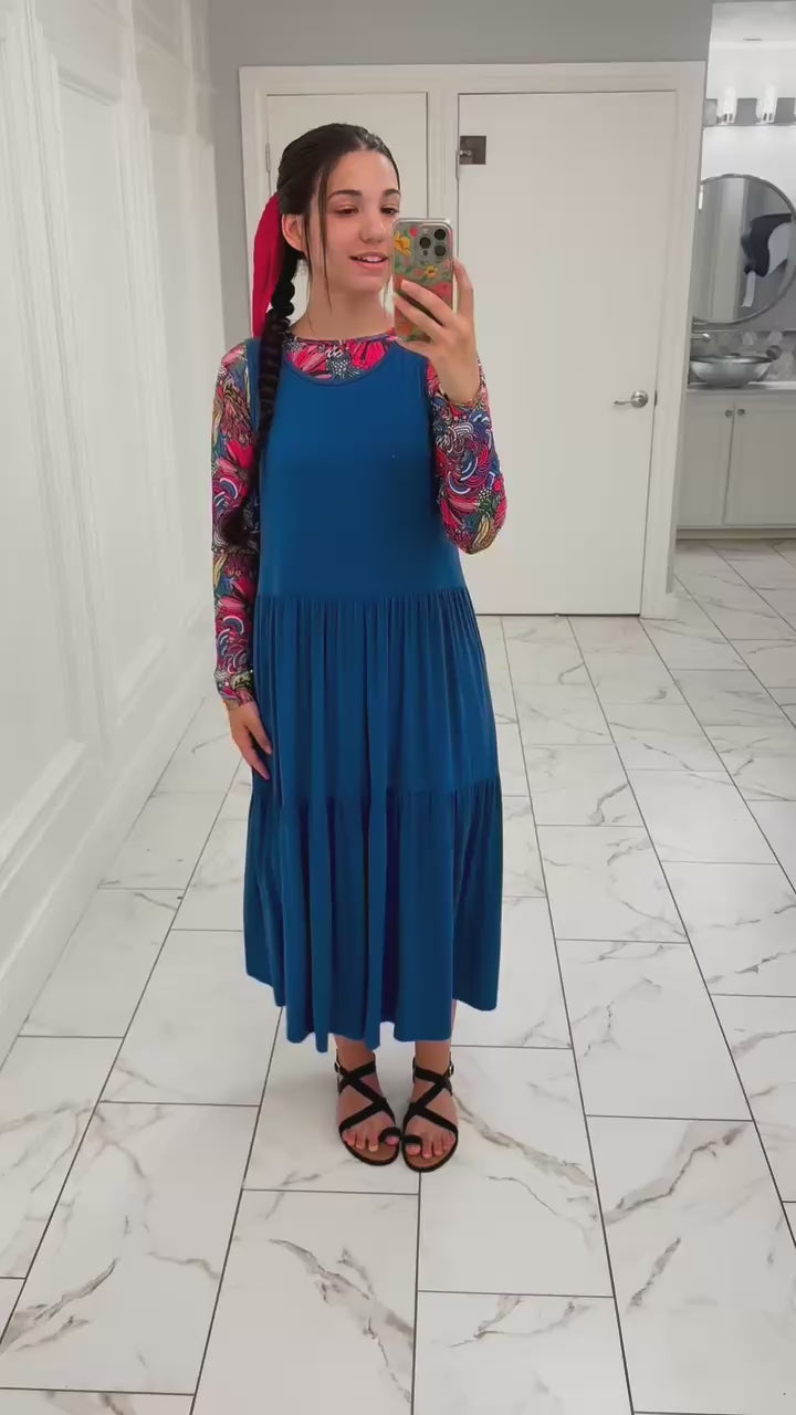 Model wearing the Whitney Layering Dress, showcasing its lightweight fabric and versatile fit with 360° views and close-up details of the texture and drape.