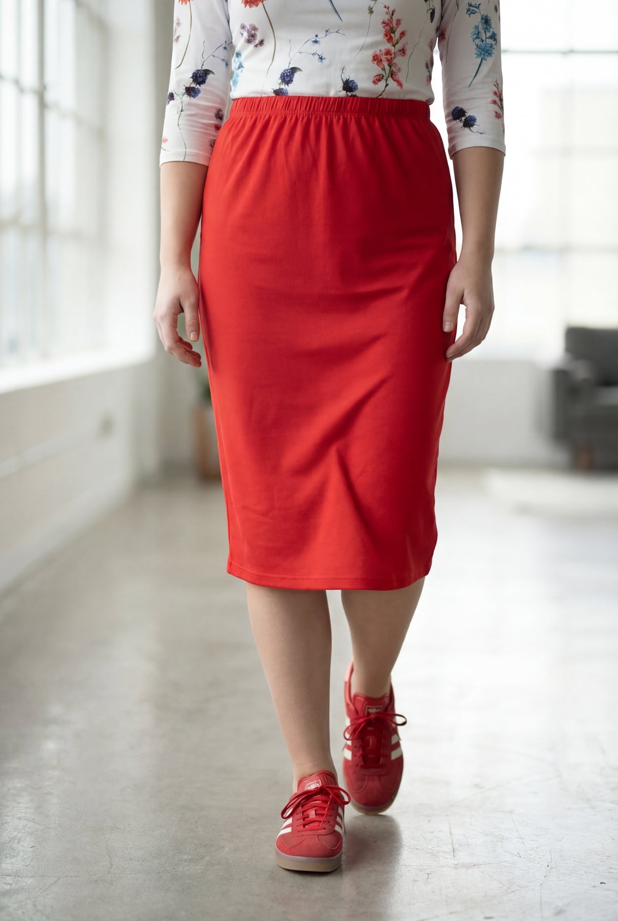 Model wearing Nuggles® 27" Classic Skirt in Red