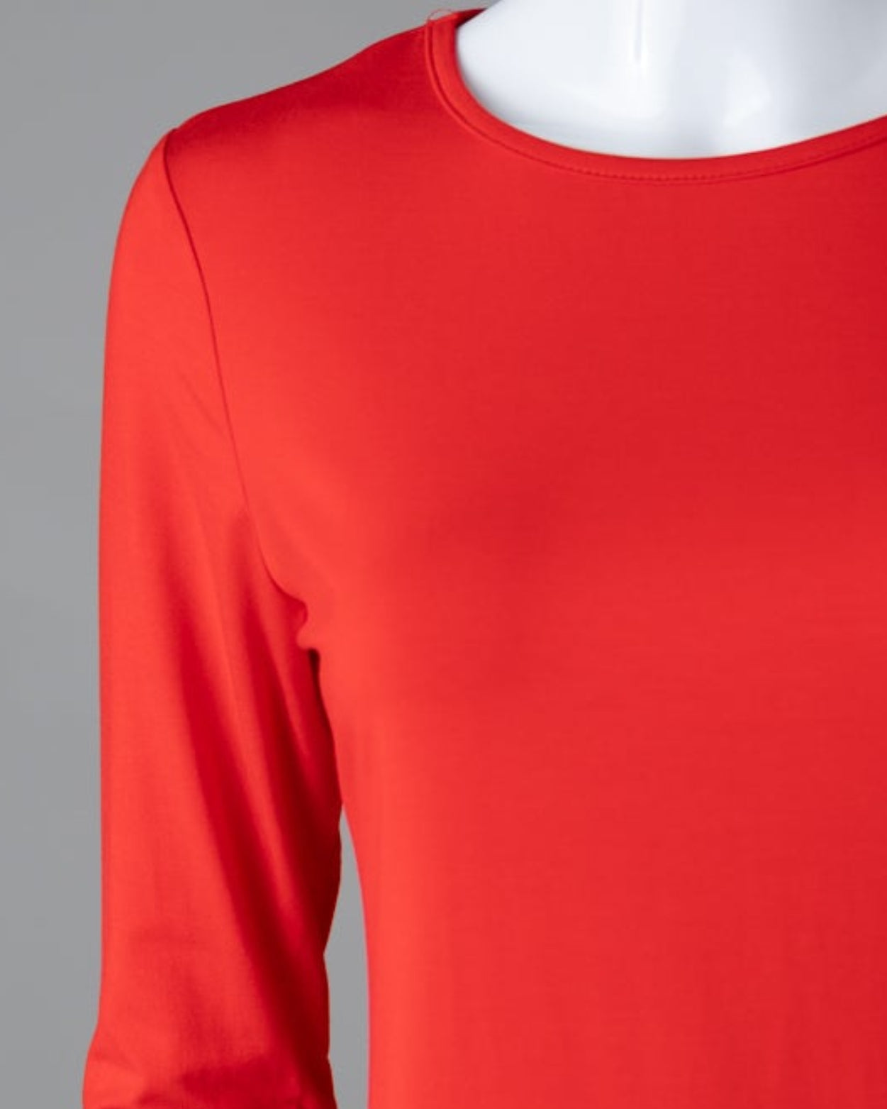 Model wearing Nuggles® 3/4 Essential Tee in Red