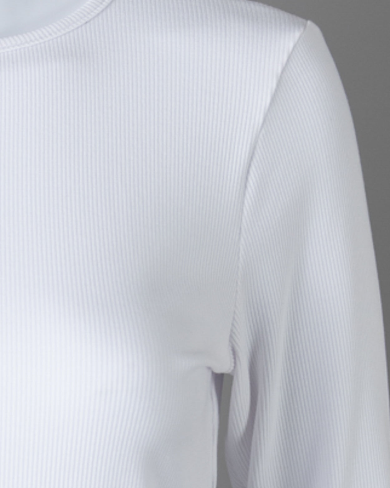 Model wearing Nuggles® 3/4 Essential Ribbed Tee in White
