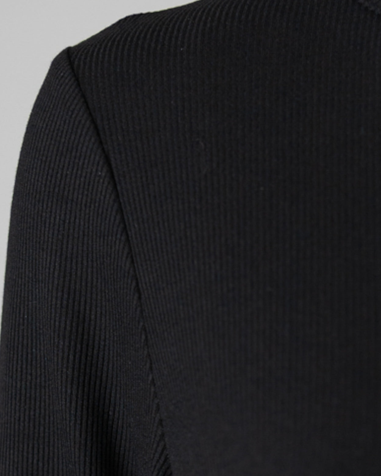 Model wearing Nuggles® 3/4 Essential Ribbed Tee in Black
