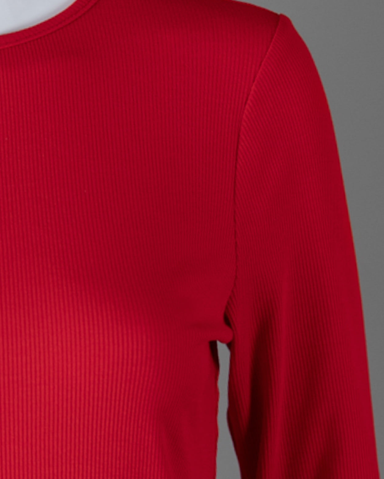Model wearing Nuggles® 3/4 Essential Ribbed Tee in Red