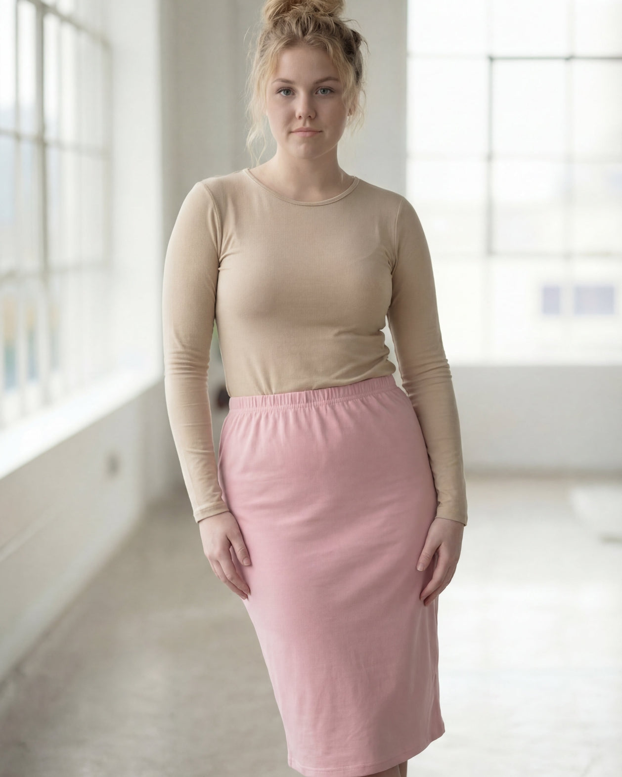 Model wearing Nuggles® 27" Classic Skirt in Rose