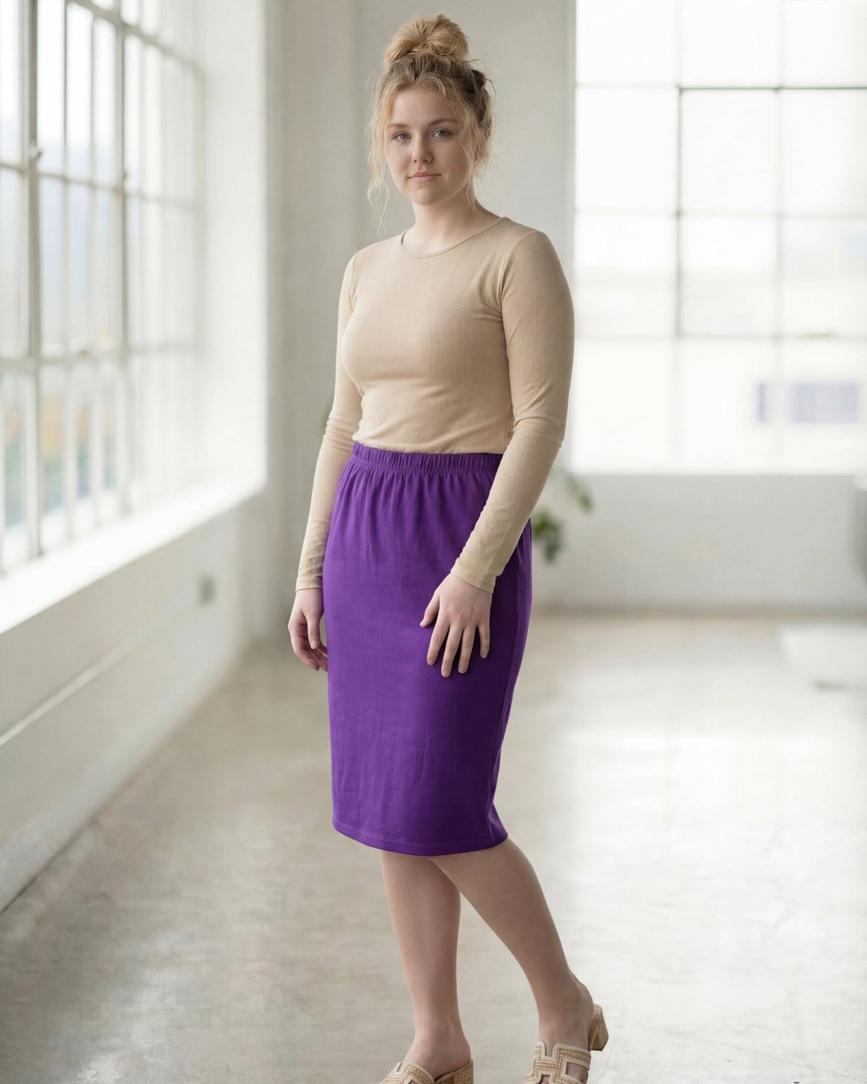 Model wearing Nuggles® 27" Classic Skirt in Royal Purple