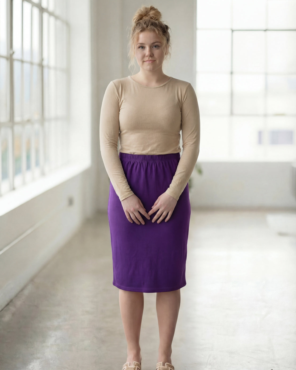 Model wearing Nuggles® 27" Classic Skirt in Royal Purple