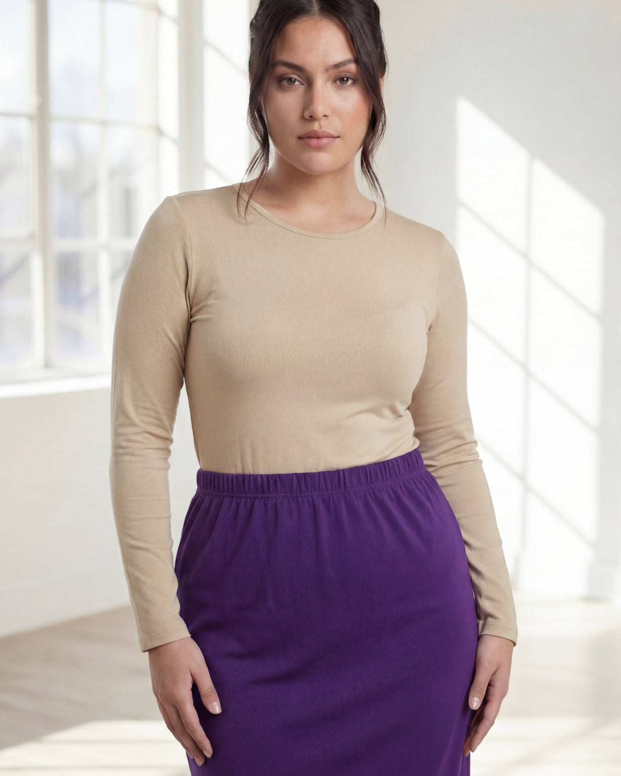 Model wearing Nuggles® 31" Classic Skirt in Royal Purple