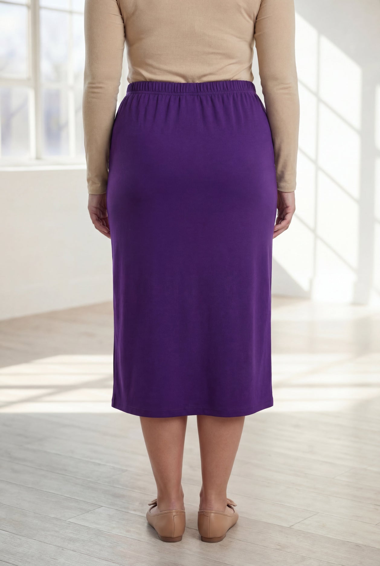 Model wearing Nuggles® 31" Classic Skirt in Royal Purple