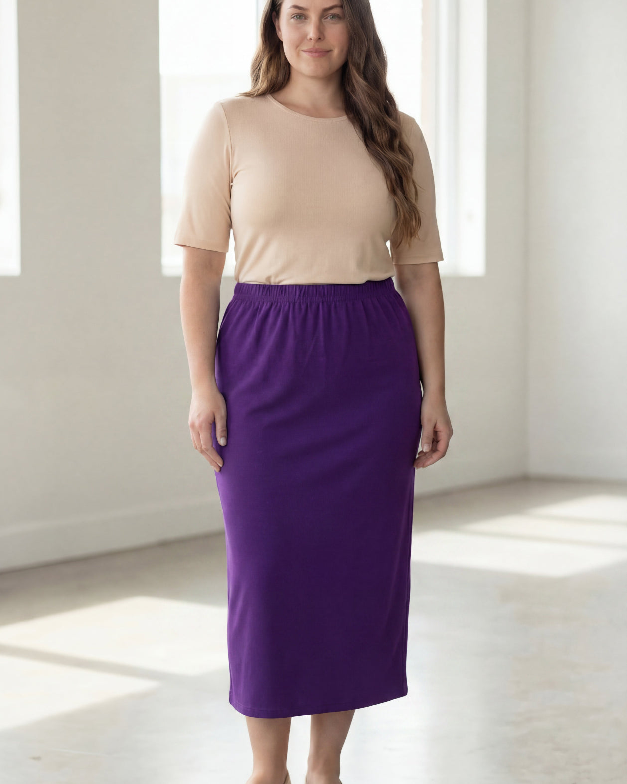 Model wearing Nuggles® 34" Classic Skirt in Royal Purple