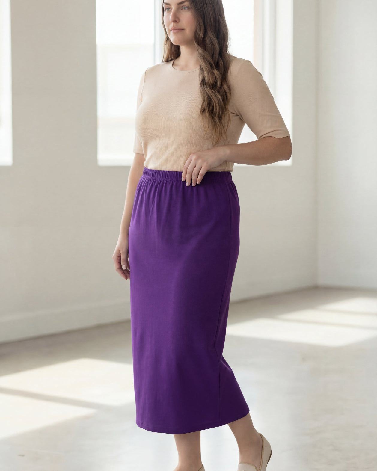Model wearing Nuggles® 34" Classic Skirt in Royal Purple