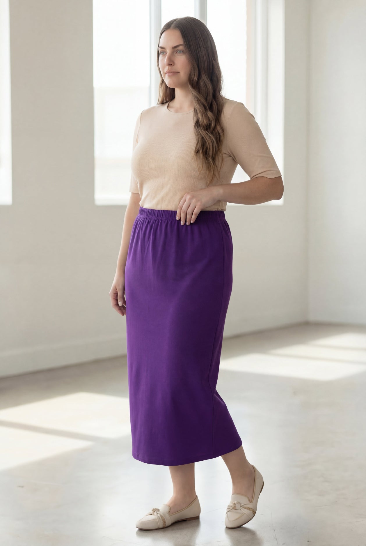 Model wearing Nuggles® 34" Classic Skirt in Royal Purple