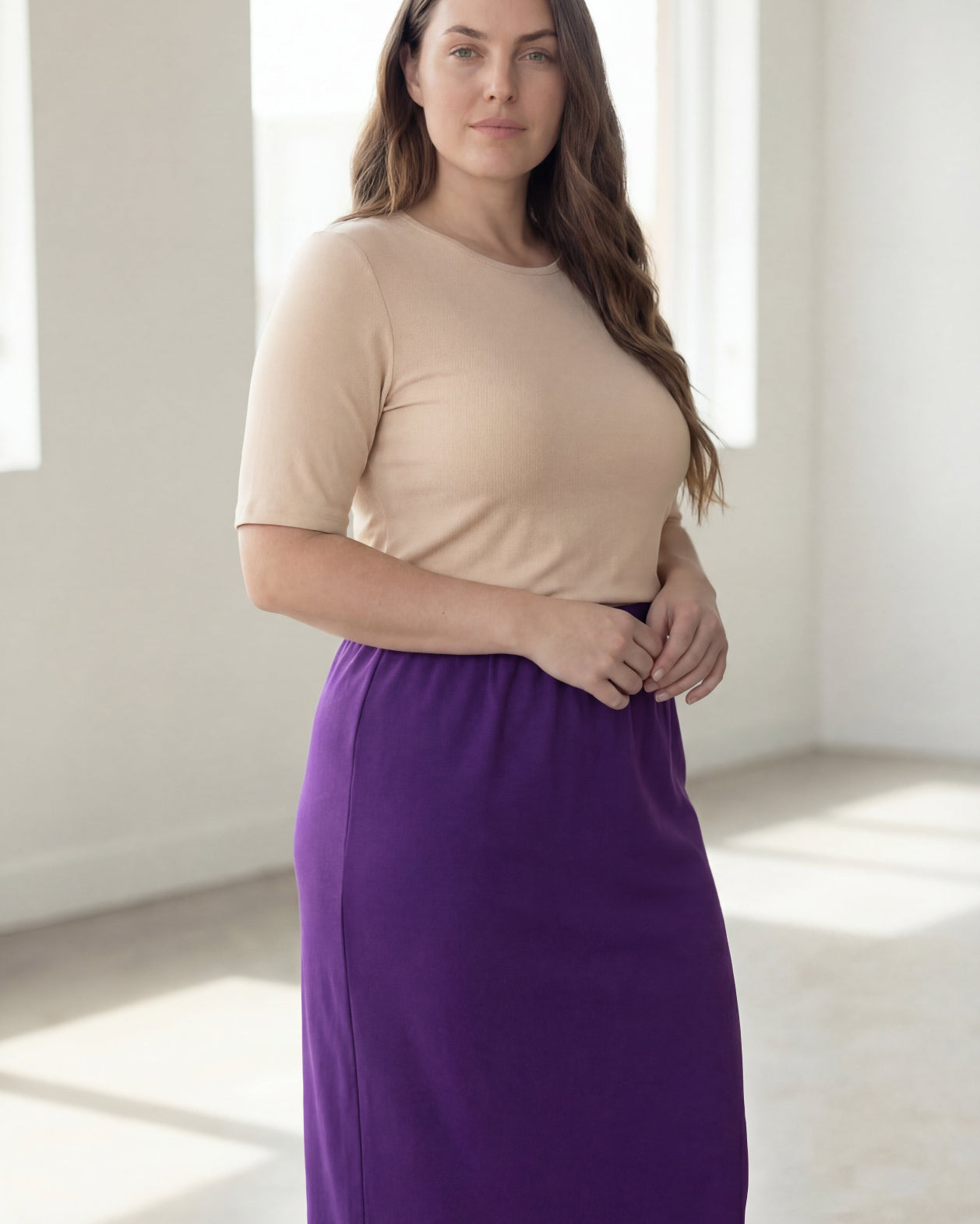 Model wearing Nuggles® 34" Classic Skirt in Royal Purple
