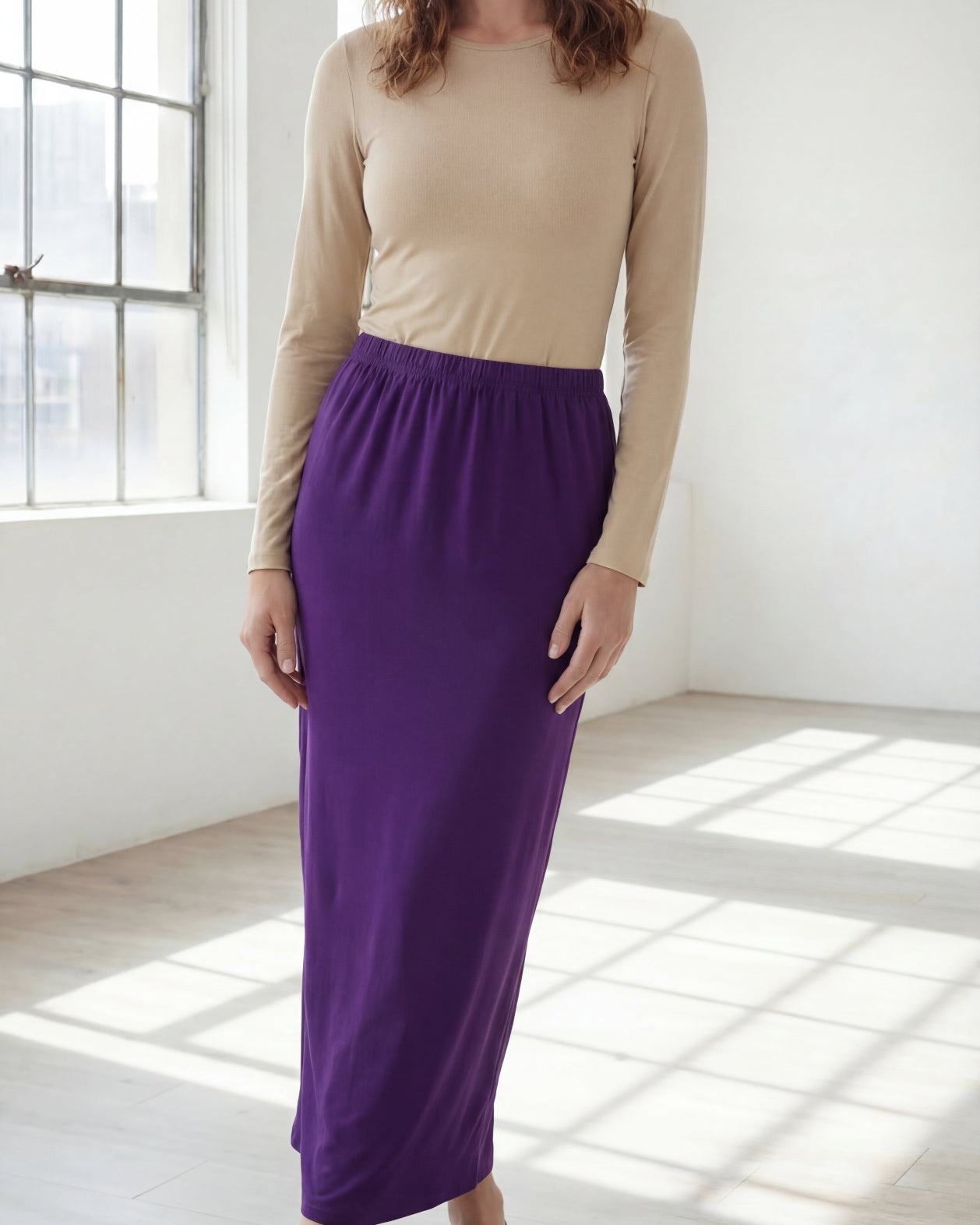 Model wearing Nuggles® 36" Classic Skirt in Royal Purple
