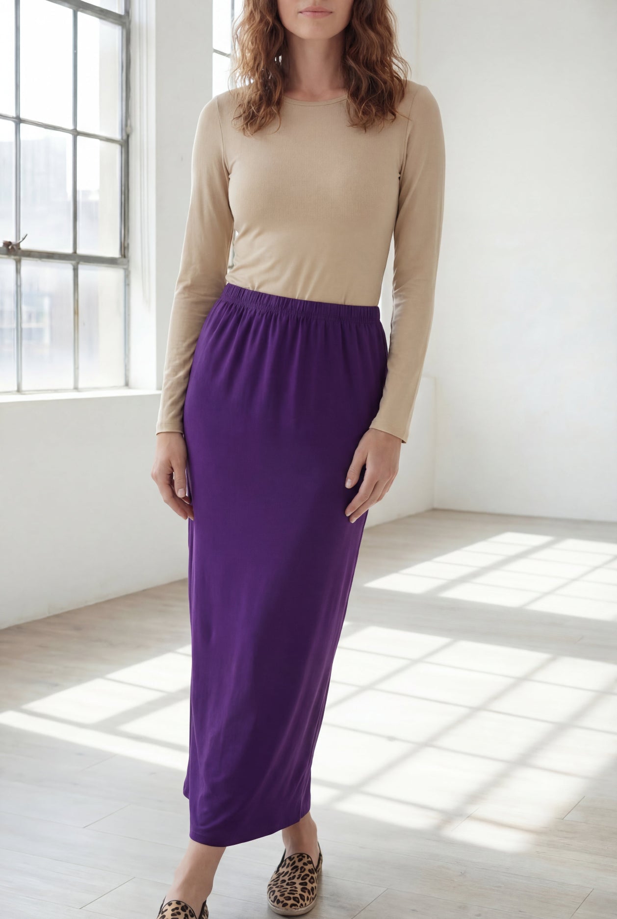 Model wearing Nuggles® 36" Classic Skirt in Royal Purple
