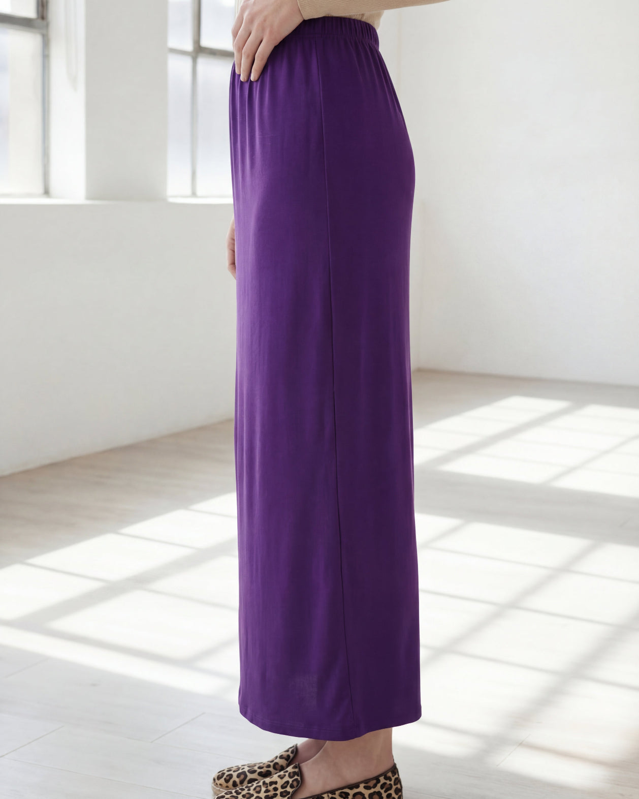 Model wearing Nuggles® 36" Classic Skirt in Royal Purple