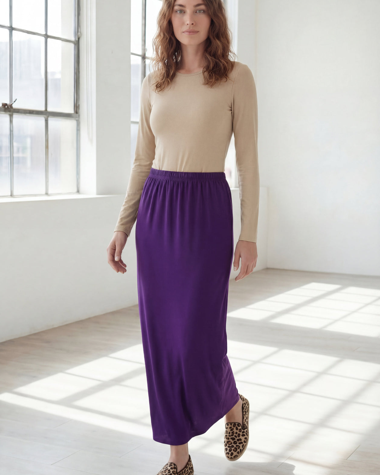Model wearing Nuggles® 36" Classic Skirt in Royal Purple