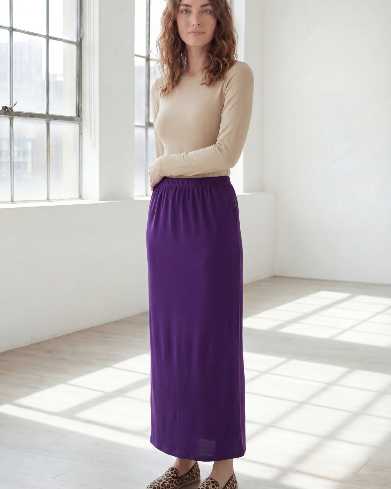 Model wearing Nuggles® 36" Classic Skirt in Royal Purple