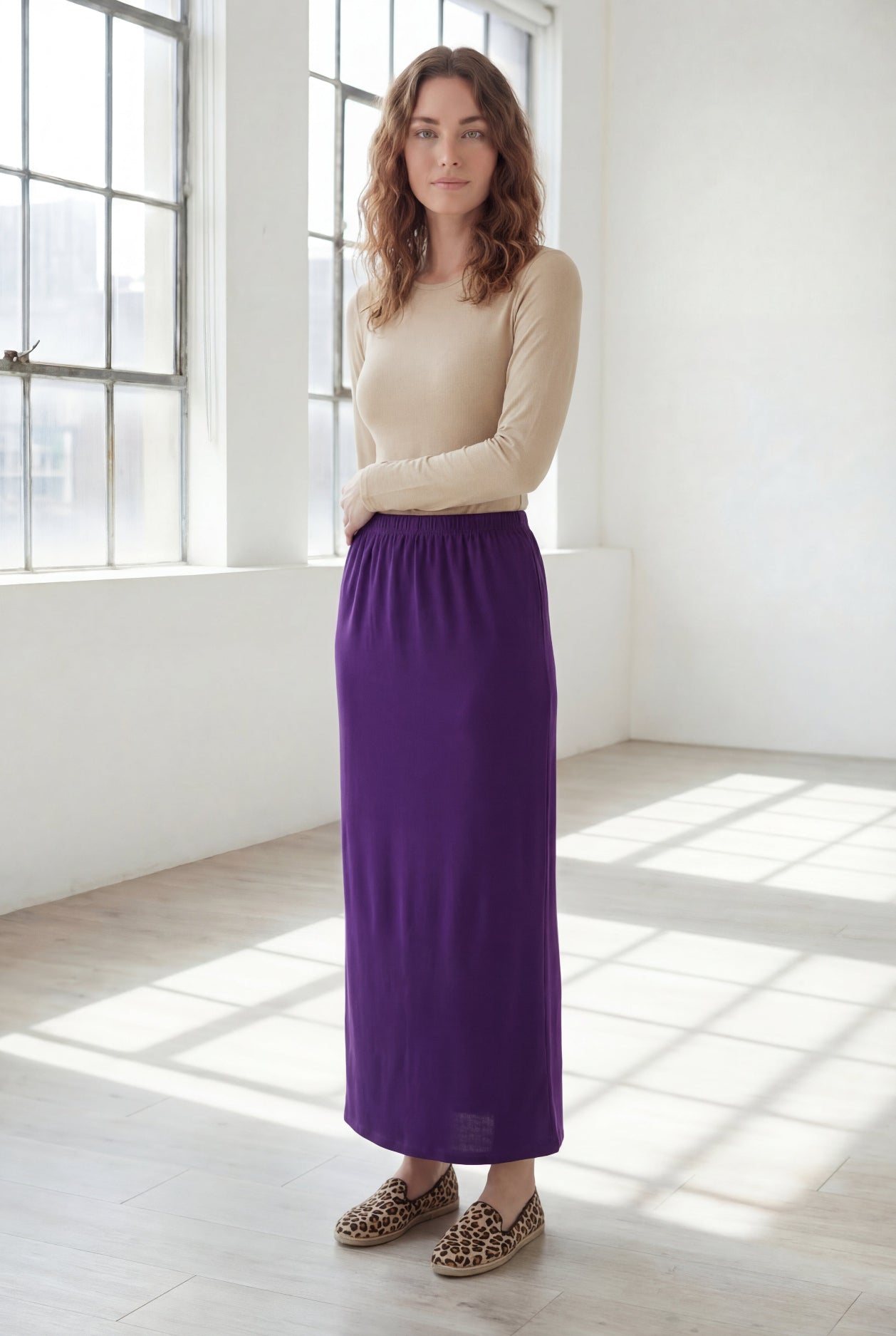 Model wearing Nuggles® 36" Classic Skirt in Royal Purple