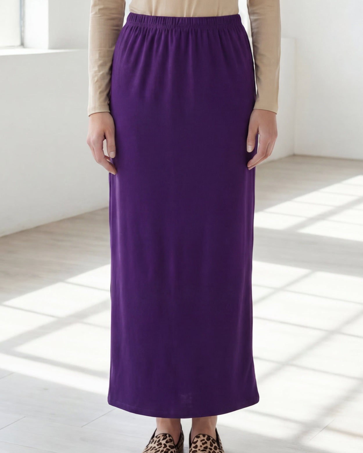 Model wearing Nuggles® 36" Classic Skirt in Royal Purple