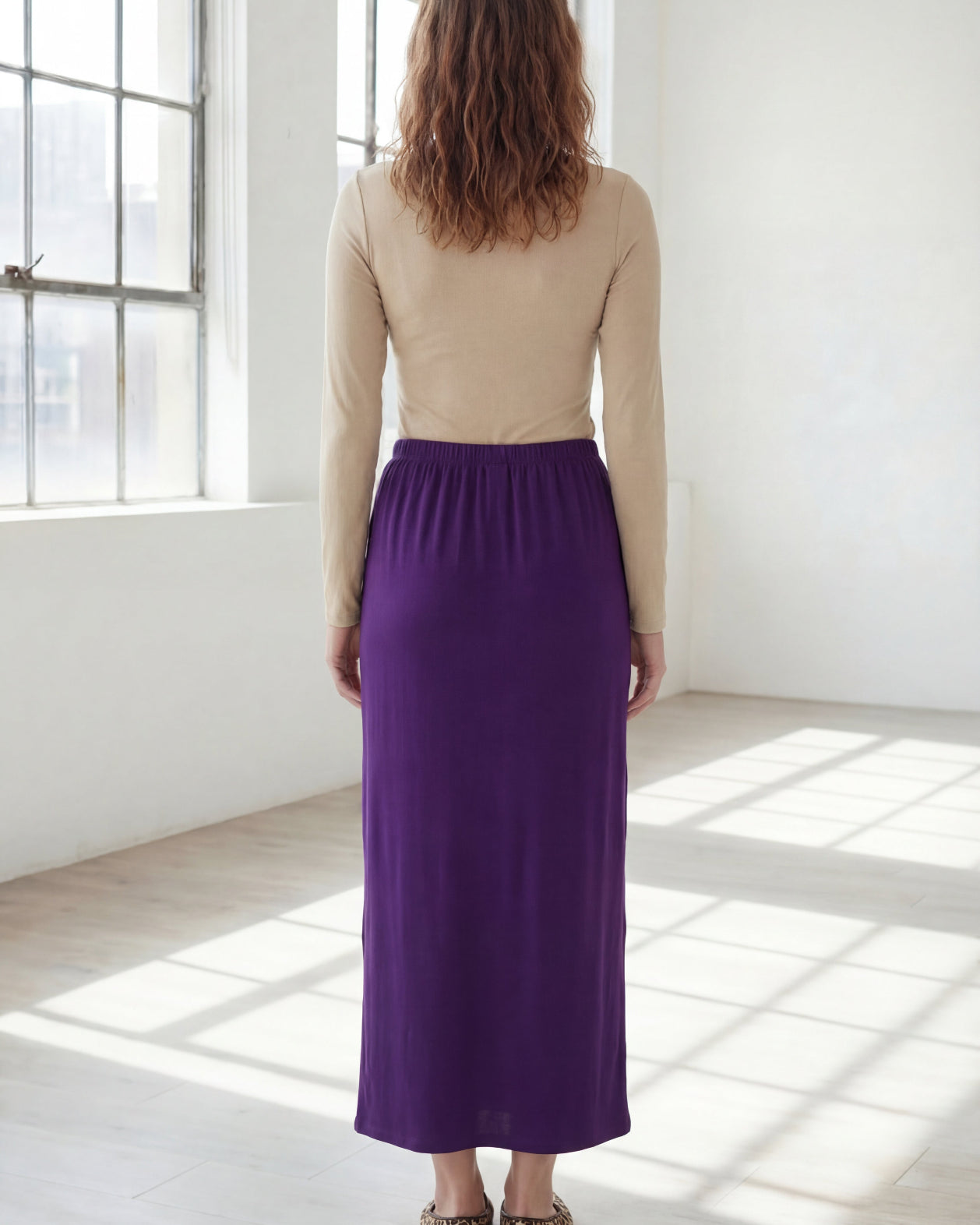 Model wearing Nuggles® 36" Classic Skirt in Royal Purple