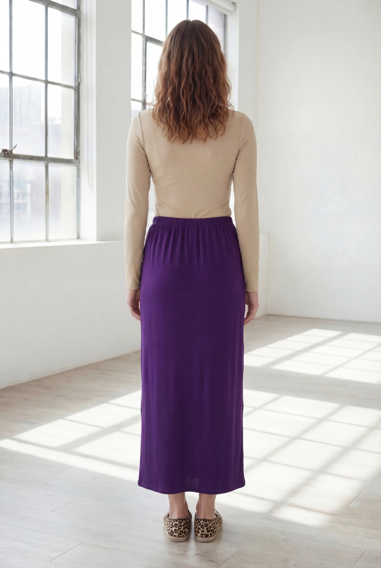 Model wearing Nuggles® 36" Classic Skirt in Royal Purple