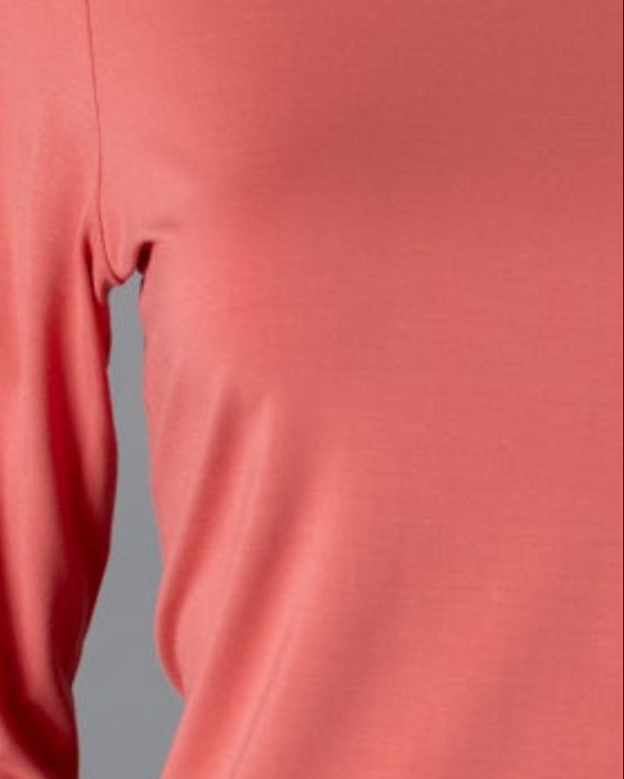Model wearing Nuggles® 3/4 Essential Tee in Salmon
