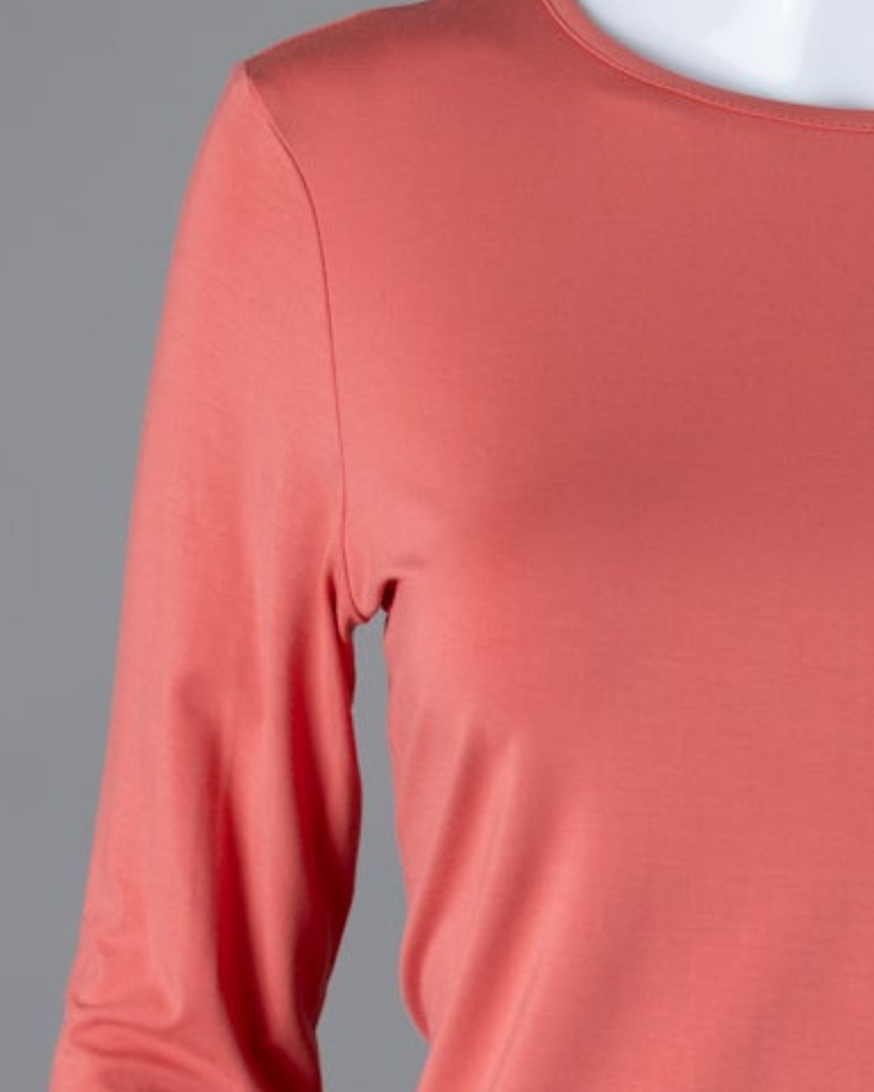 Model wearing Nuggles® 3/4 Essential Tee in Salmon