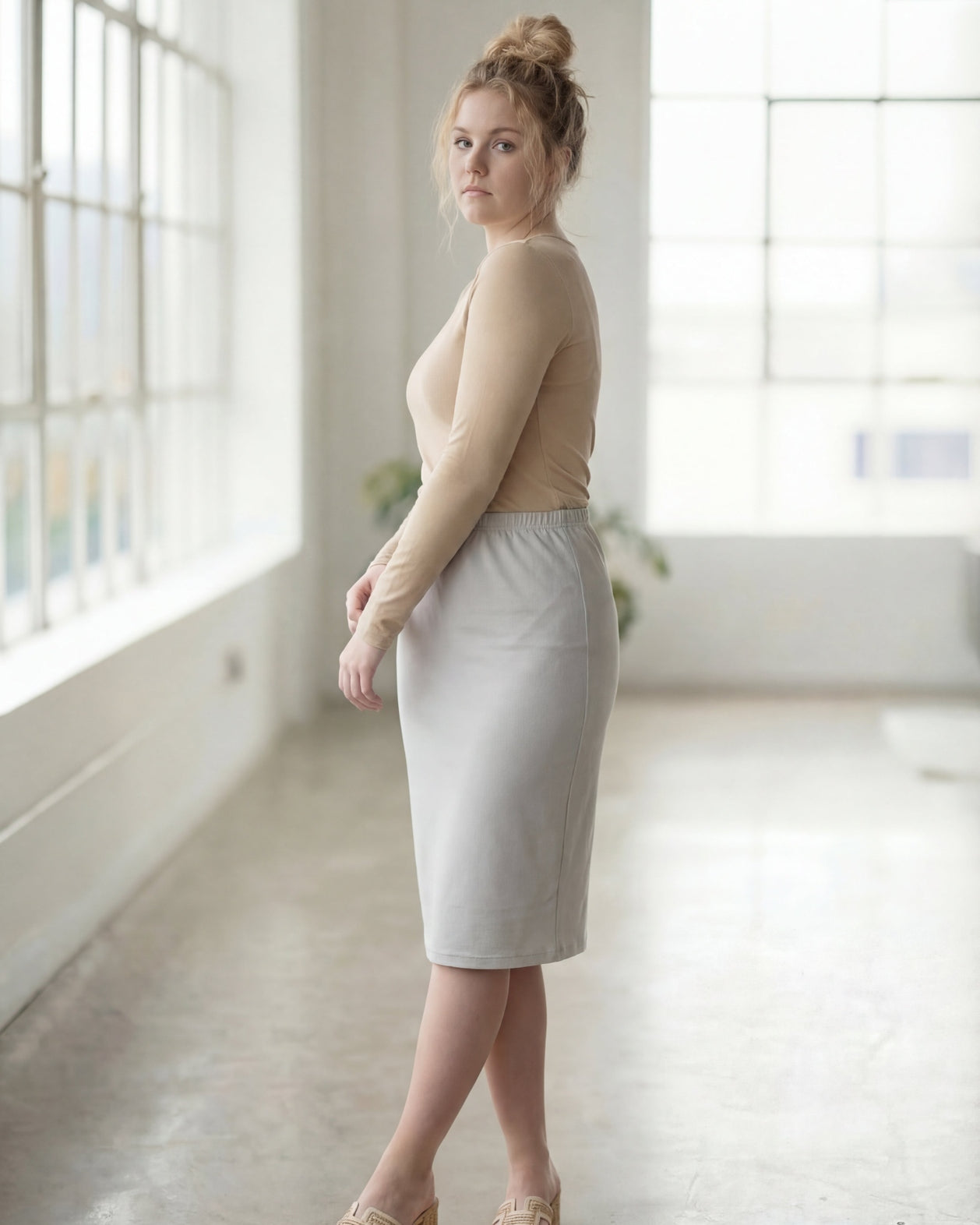 Model wearing Nuggles® 27" Classic Skirt in Silver