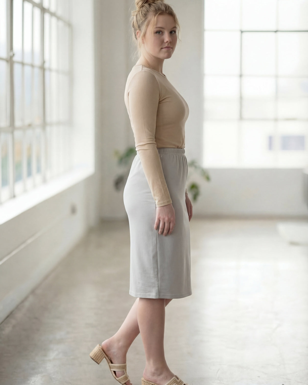 Model wearing Nuggles® 27" Classic Skirt in Silver