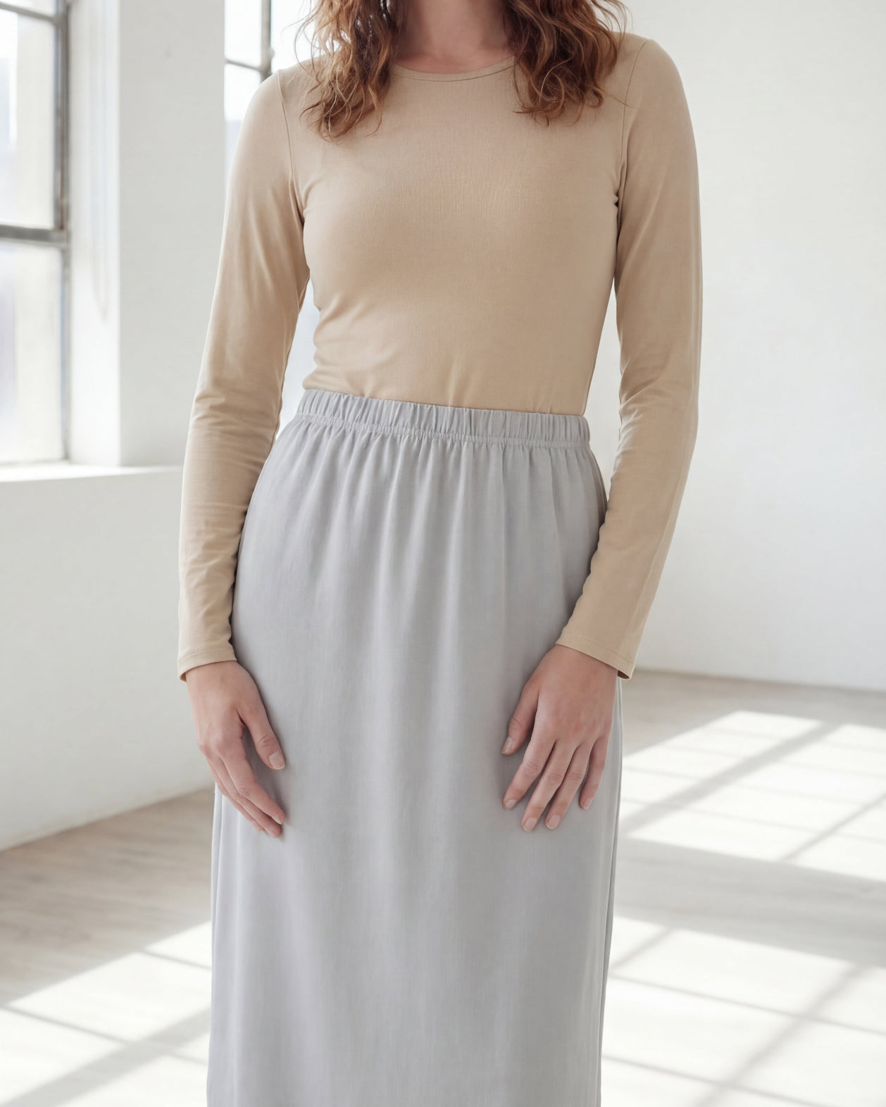Model wearing Nuggles® 36" Classic Skirt in Silver