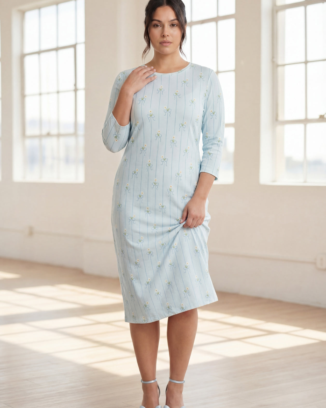 Model wearing Nuggles® The Original Midi Layering Dress in Sky Petal