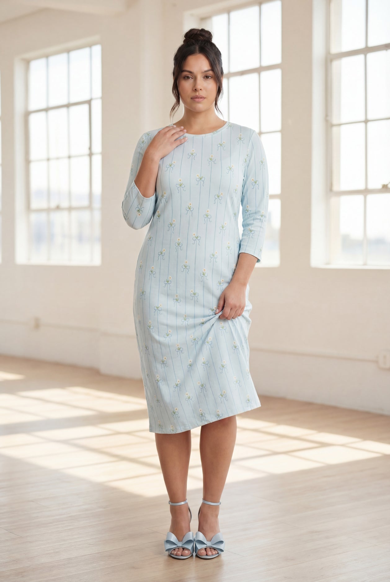 Model wearing Nuggles® The Original Midi Layering Dress in Sky Petal