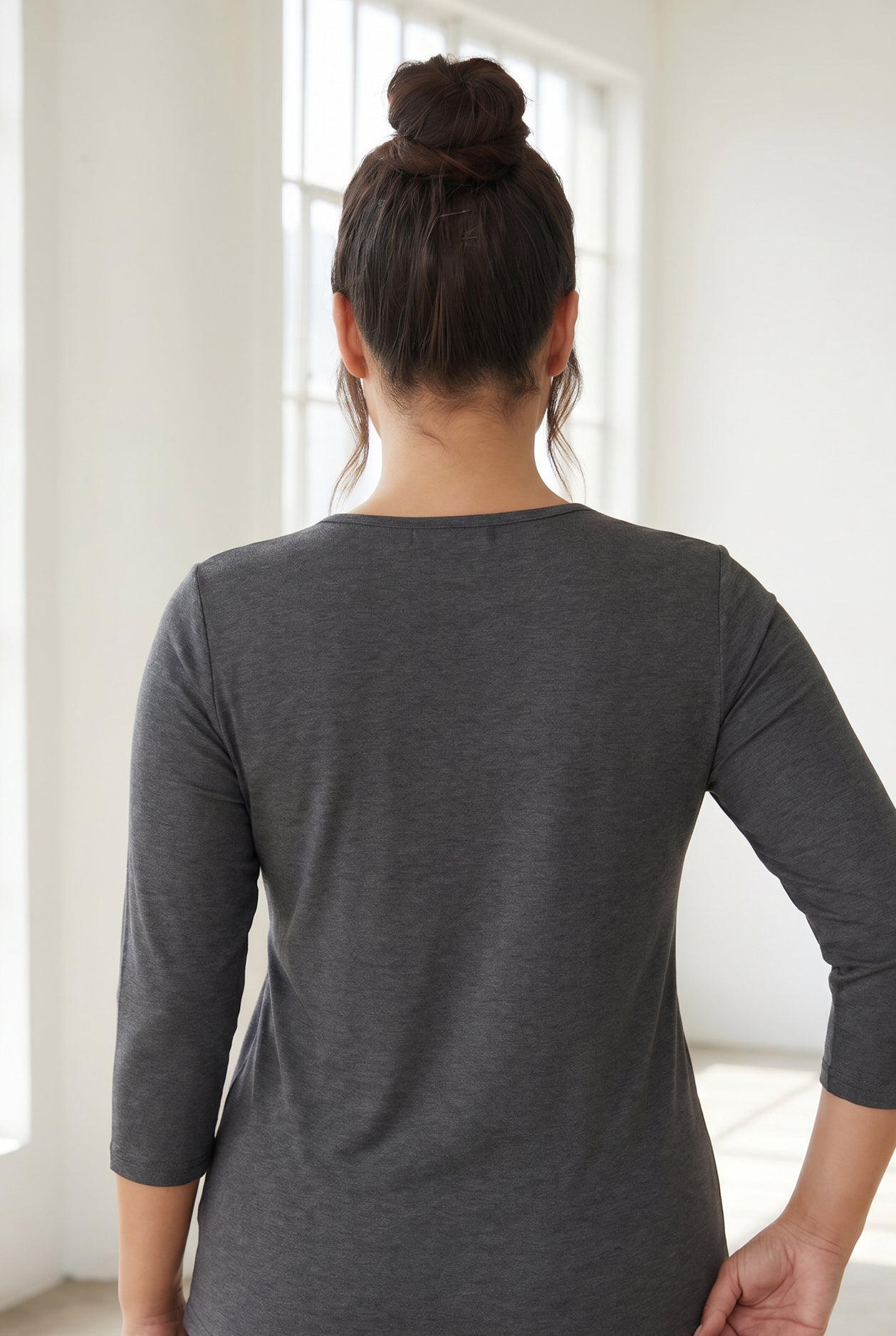 Model wearing Nuggles® Half Sleeve Essential Tee in Slate Gray