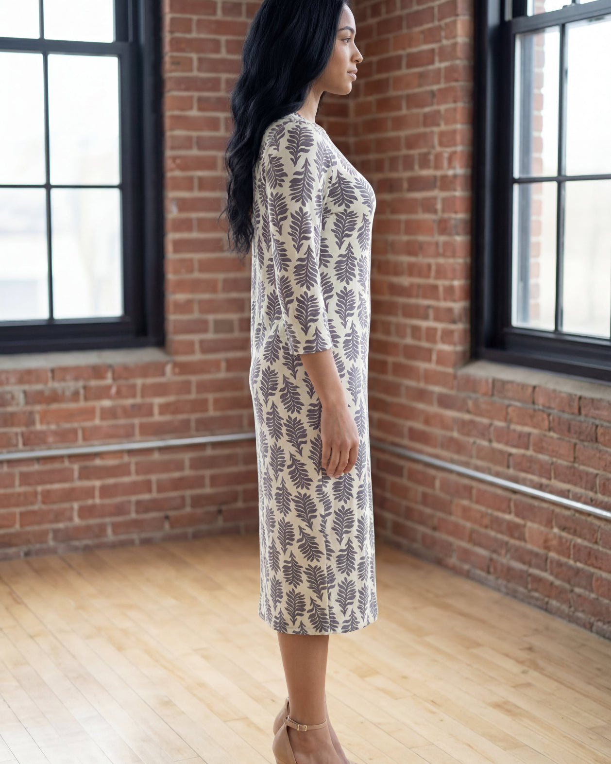 Model wearing Nuggles® Midi Layering Dress in Soft Fern
