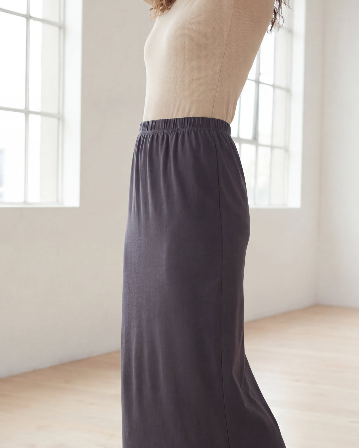 Model wearing Nuggles® 36" Classic Skirt in Steel Gray
