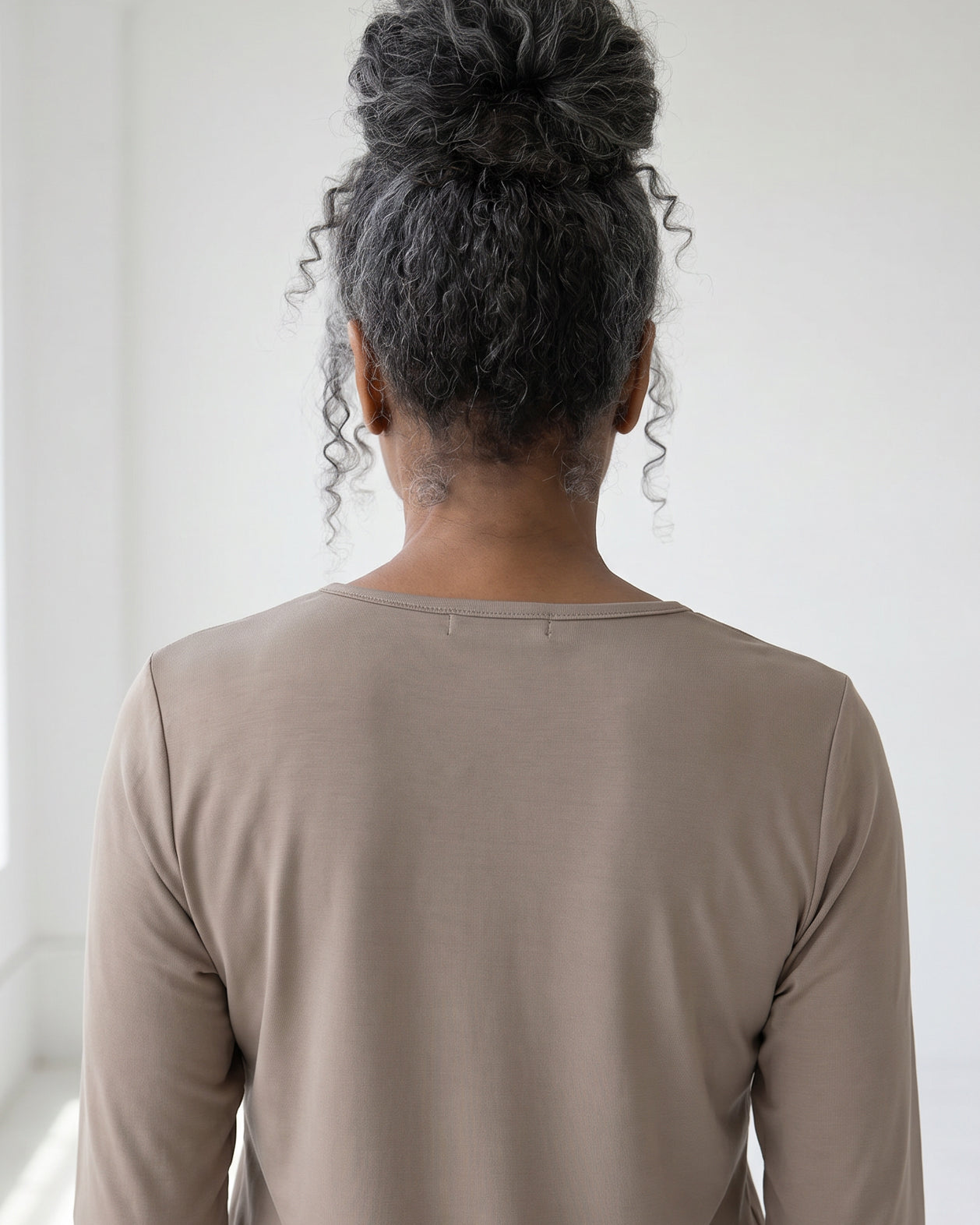 Model wearing Nuggles® Half Sleeve Essential Tee in Taupe