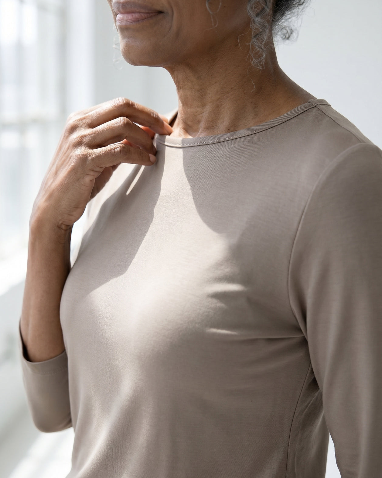 Model wearing Nuggles® Half Sleeve Essential Tee in Taupe