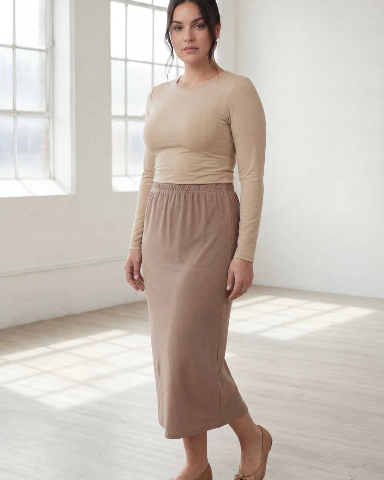 Model wearing Nuggles® 31" Classic Skirt in Taupe