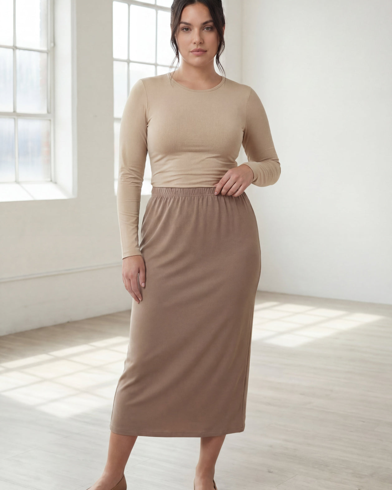 Model wearing Nuggles® 31" Classic Skirt in Taupe