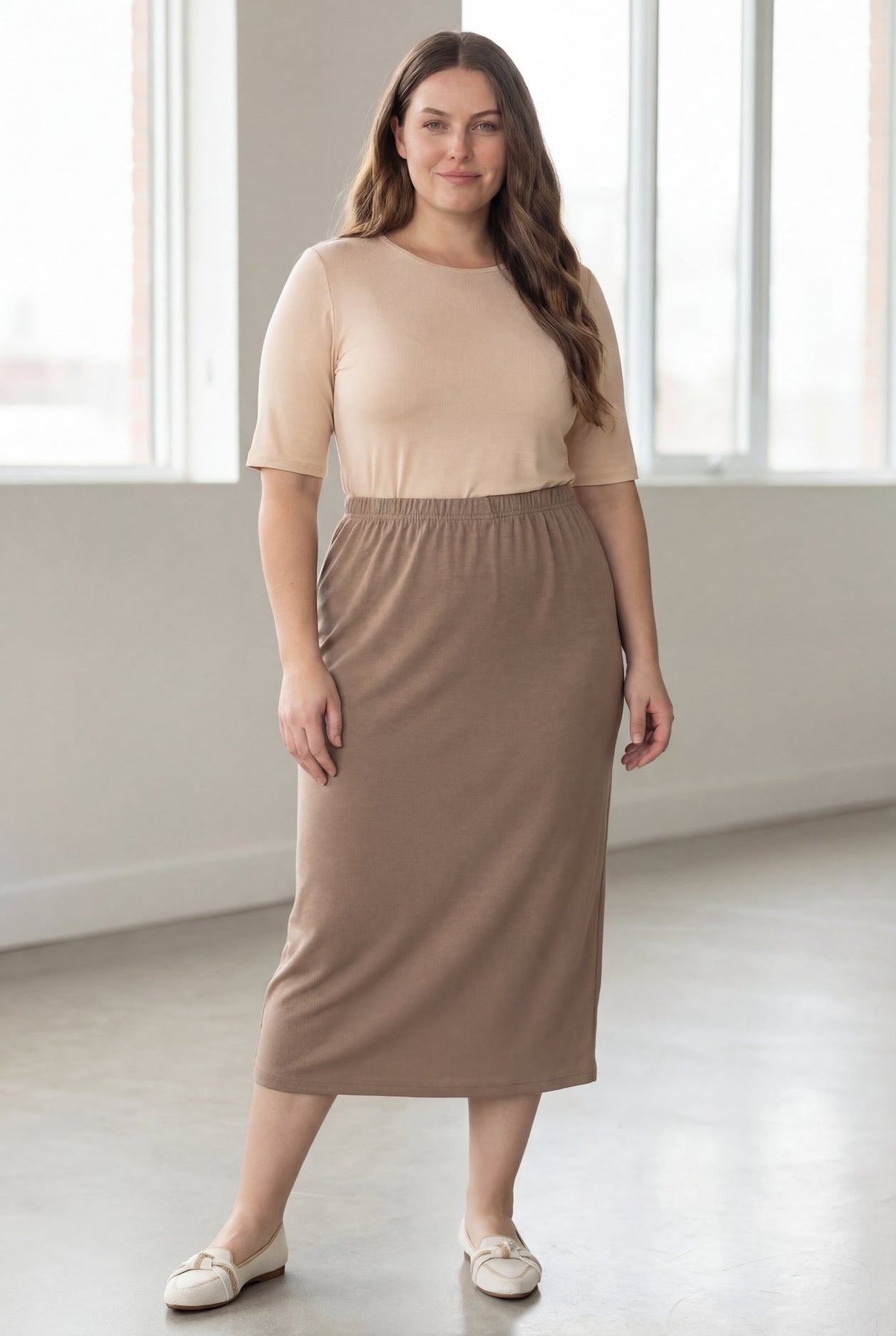 Model wearing Nuggles® 34" Classic Skirt in Taupe