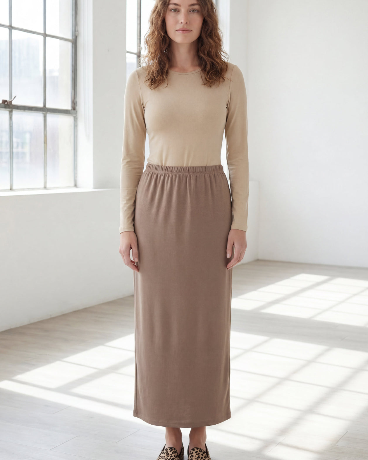 Model wearing Nuggles® 36" Classic Skirt in Taupe