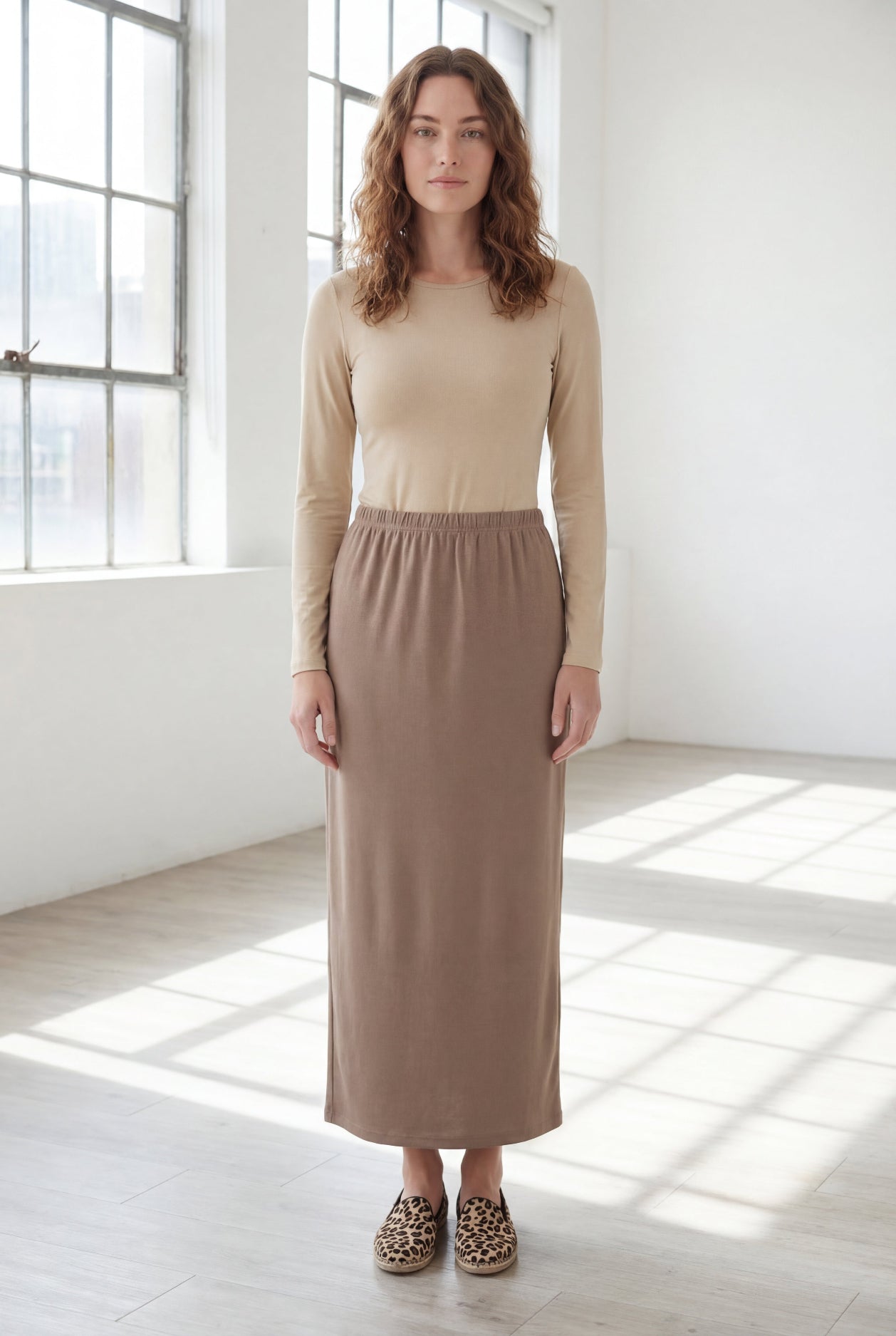 Model wearing Nuggles® 36" Classic Skirt in Taupe