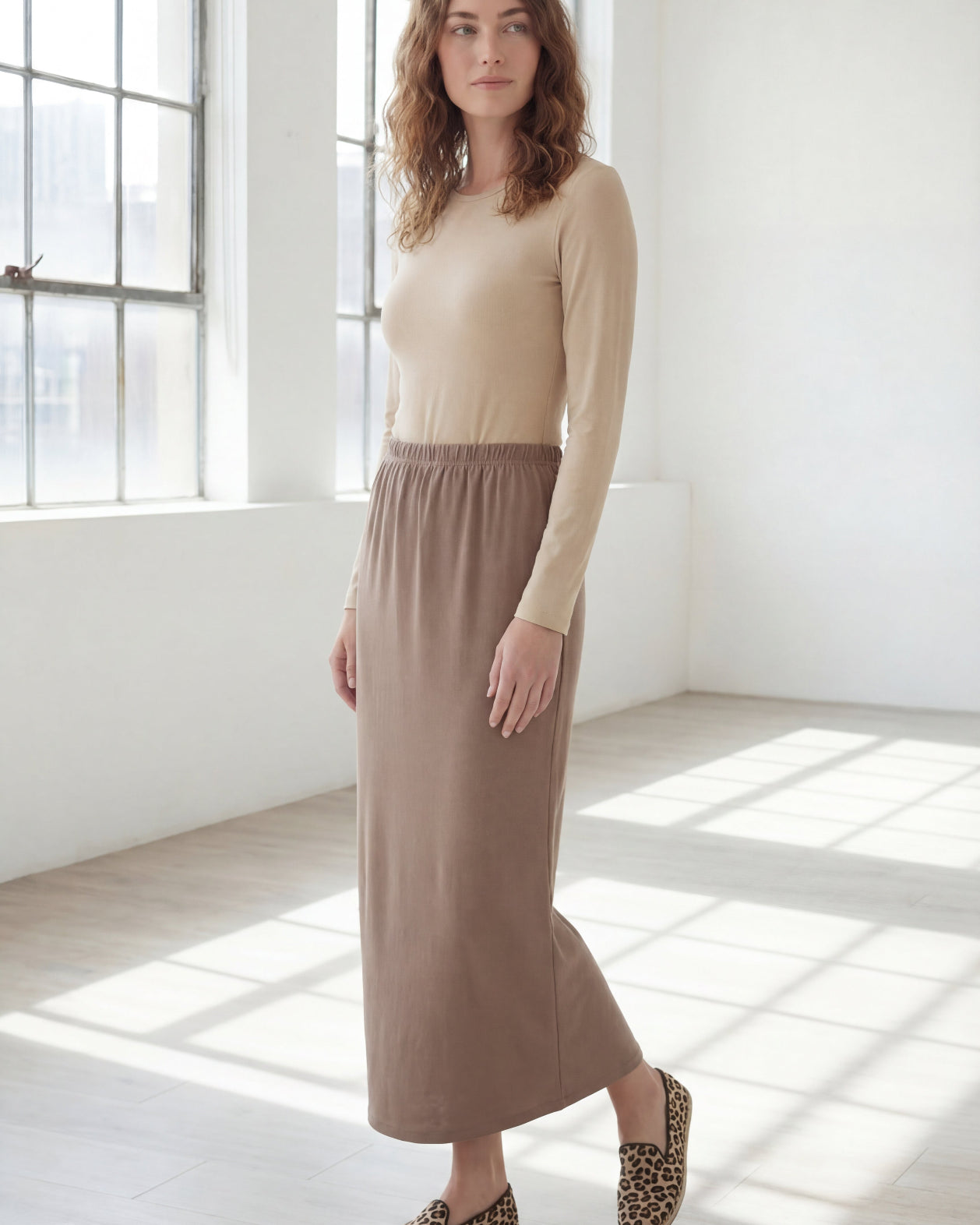 Model wearing Nuggles® 36" Classic Skirt in Taupe