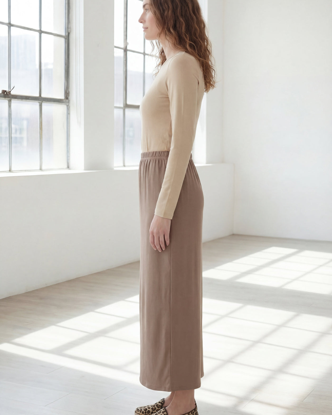 Model wearing Nuggles® 36" Classic Skirt in Taupe