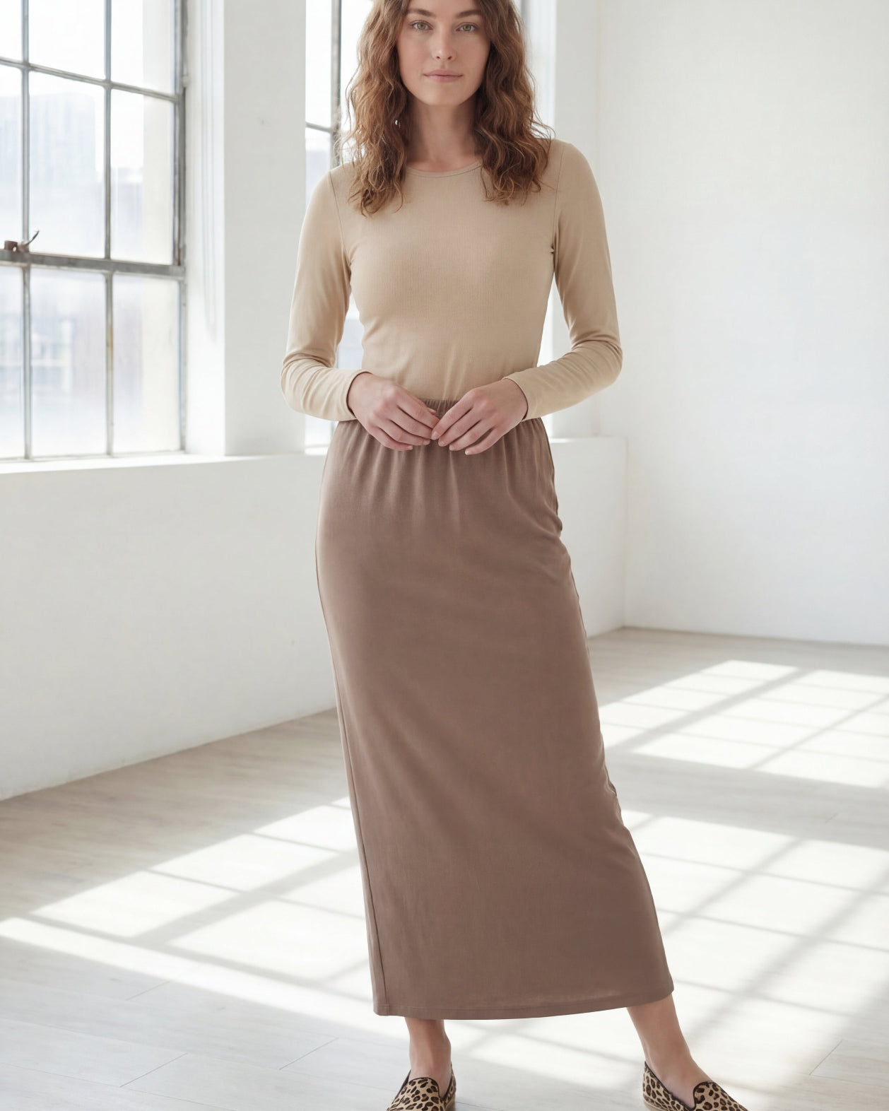 Model wearing Nuggles® 36" Classic Skirt in Taupe