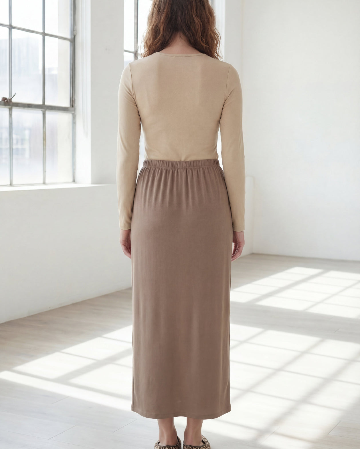 Model wearing Nuggles® 36" Classic Skirt in Taupe