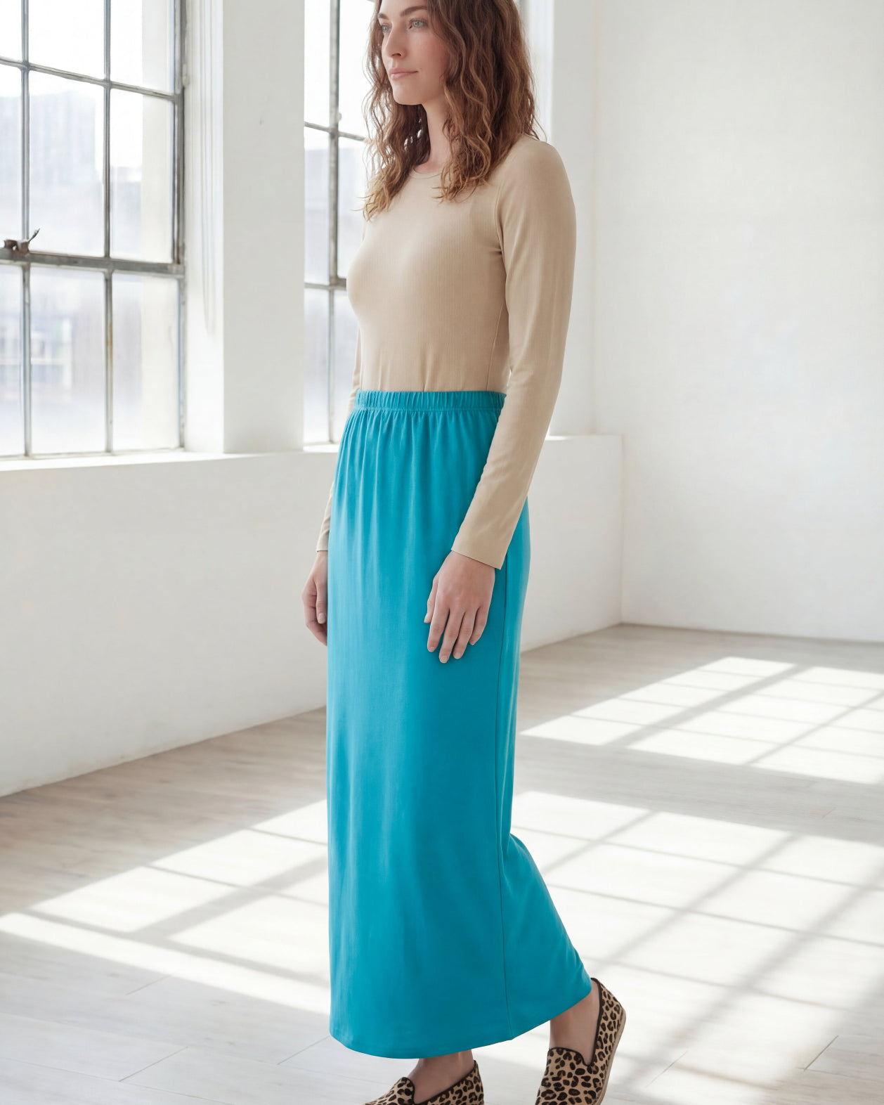 Model wearing Nuggles® 36" Classic Skirt in Teal